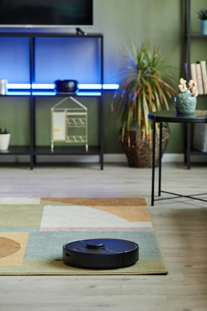 Robot Vacuum Cleaner on Floor Background